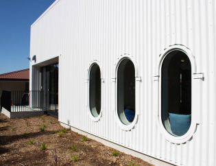 Waihi-Beach-Library-Oval-windows-outside